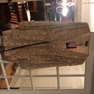 Selling gold plunge sequin long sleeved bodycon